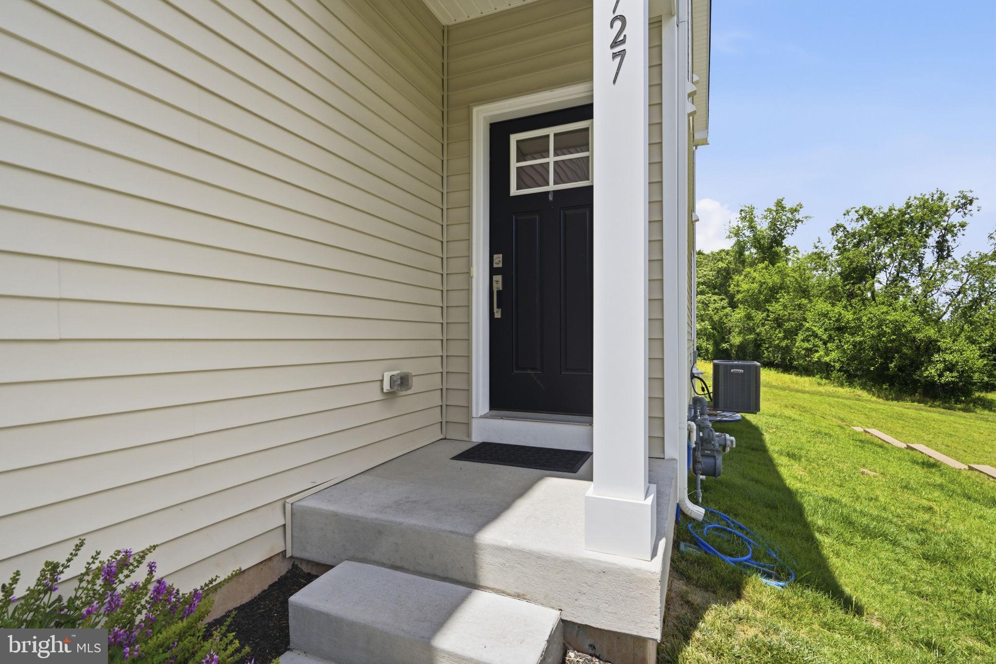 727 Hunsberger Road Spring City, PA 19475 - Photo 4 of 56 Charming entryway with lush greenery.