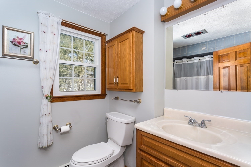 75 Jordan Road Franklin, MA 02038 - Photo 20 of 46 a bathroom with a sink and a mirror