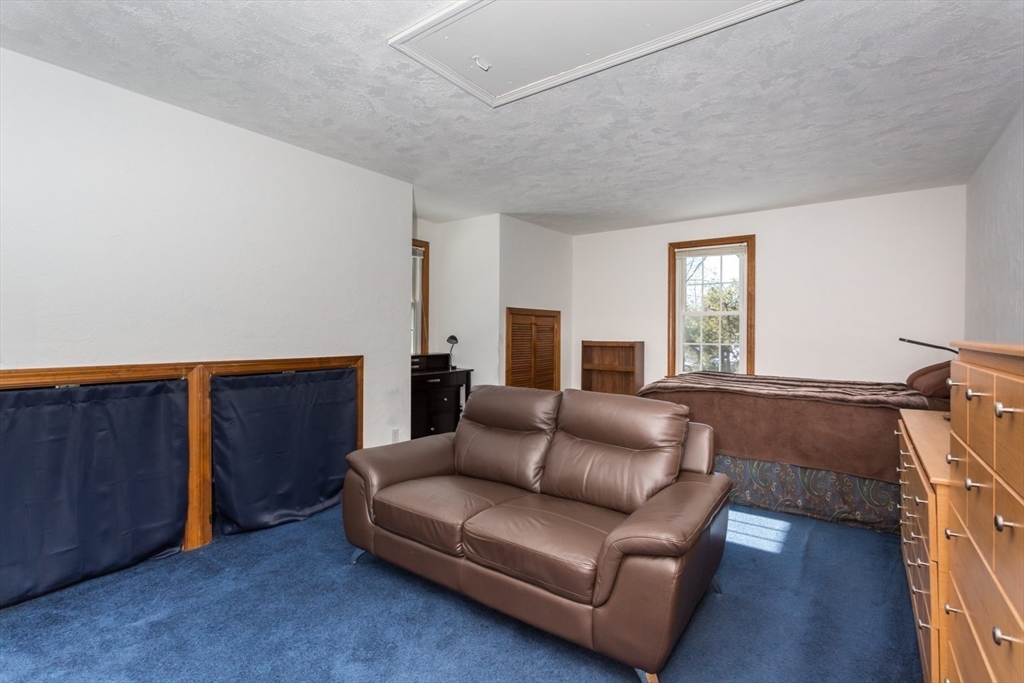 75 Jordan Road Franklin, MA 02038 - Photo 21 of 46 a living room with furniture and a window