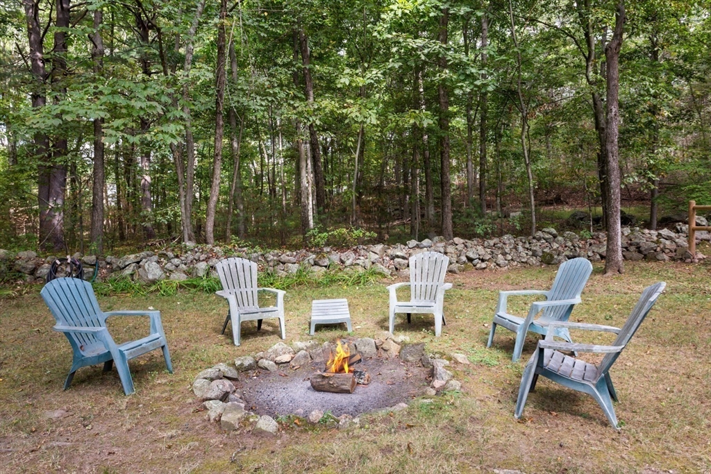 75 Jordan Road Franklin, MA 02038 - Photo 37 of 46 a view of a chairs and table in backyard