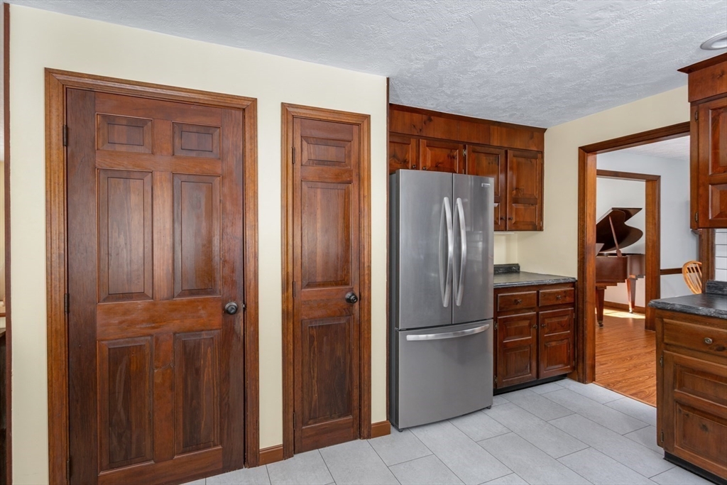 75 Jordan Road Franklin, MA 02038 - Photo 9 of 46 a kitchen with stainless steel appliances granite countertop a refrigerator and a sink