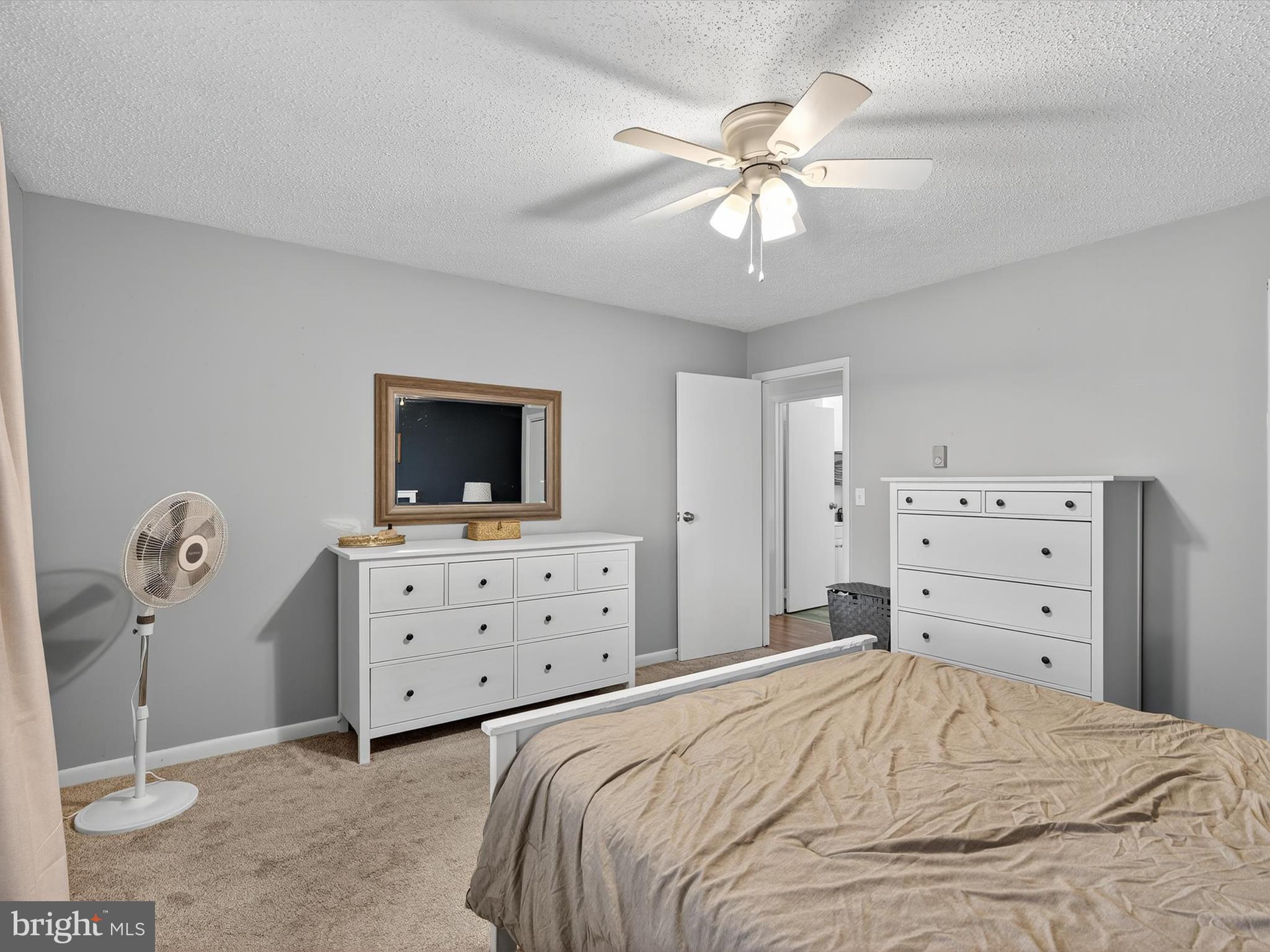 351 North Colebrook Road Manheim, PA 17545 - Photo 16 of 32 a bedroom with a bed and a chandelier