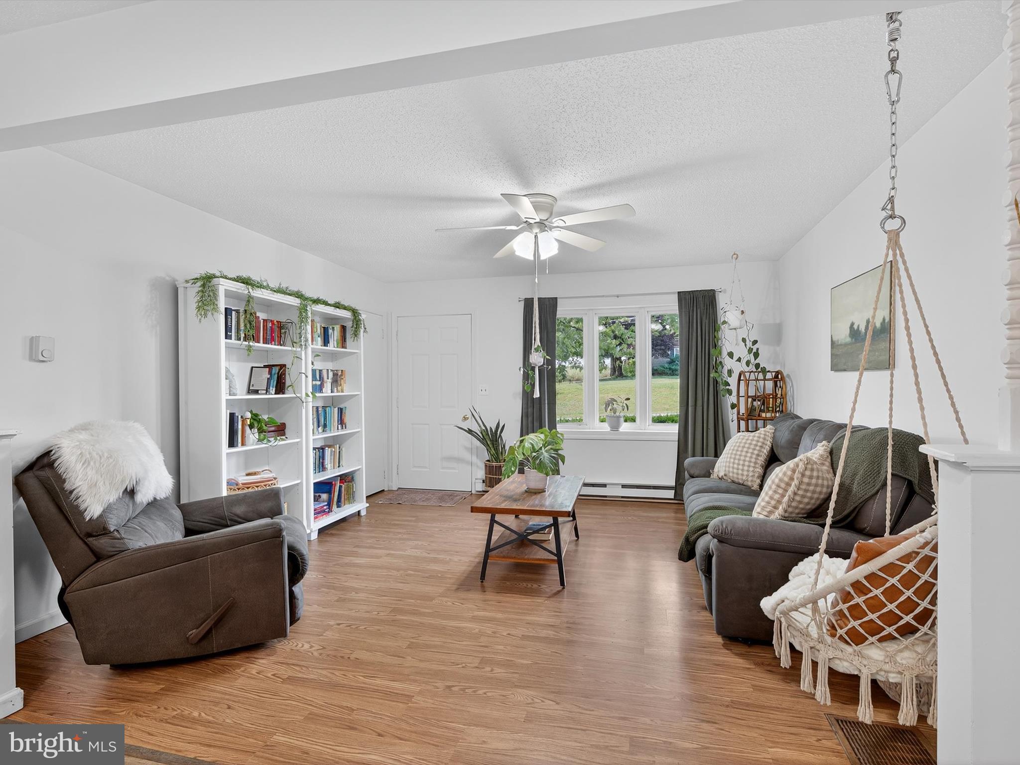 351 North Colebrook Road Manheim, PA 17545 - Photo 5 of 32 a living room with furniture and a large window