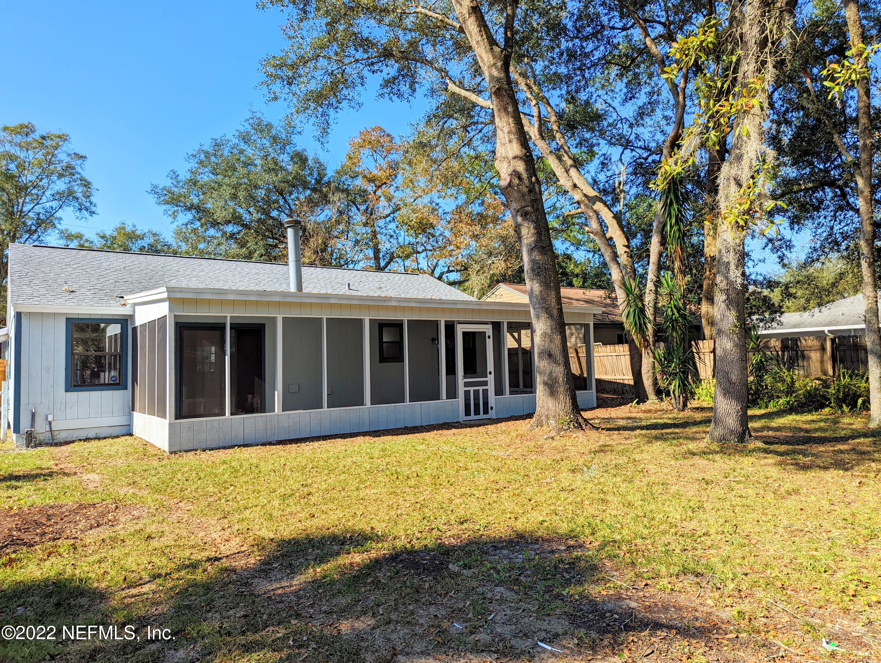 12855 Attrill Road Jacksonville, FL 32258 - Photo 14 of 16 a view of a house with a large tree