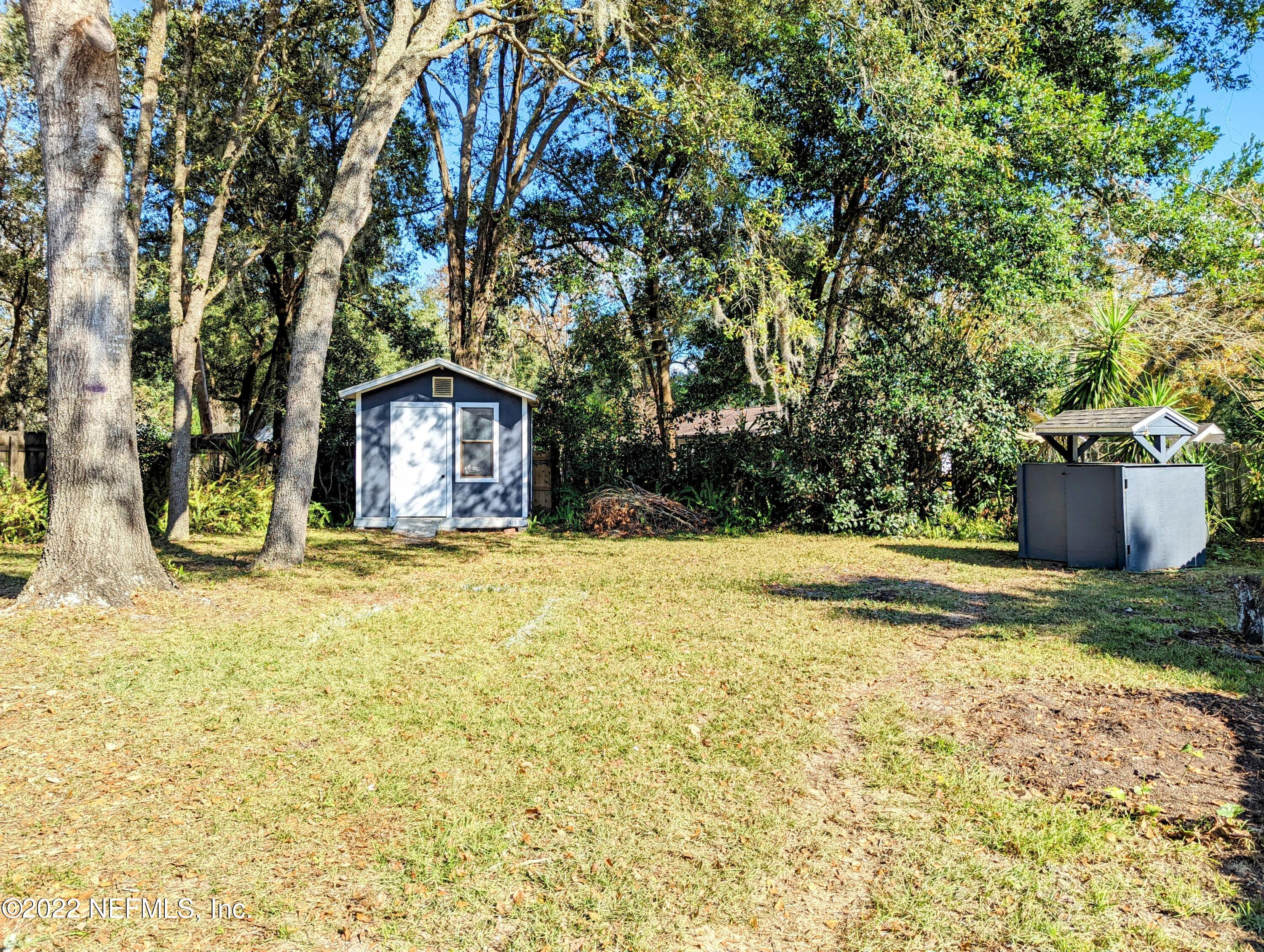 12855 Attrill Road Jacksonville, FL 32258 - Photo 15 of 16 a front view of a house with a yard