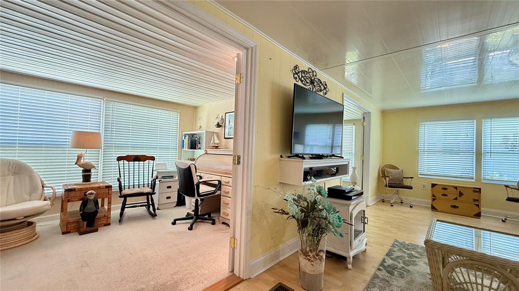 716 Blackburn Boulevard North Port, FL 34287 - Photo 21 of 48 a view of a livingroom with furniture and windows