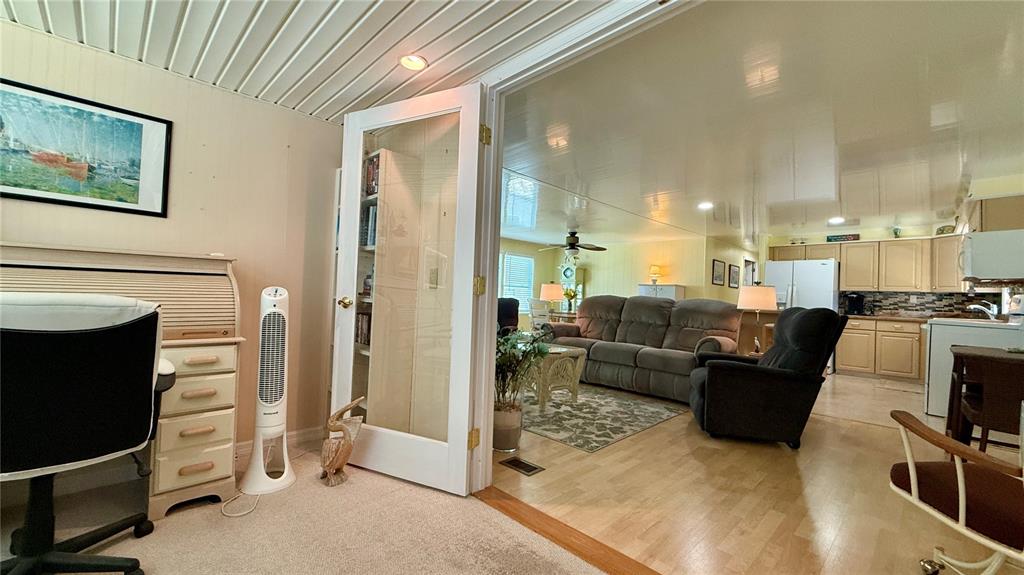 716 Blackburn Boulevard North Port, FL 34287 - Photo 23 of 48 a living room with furniture and a fireplace