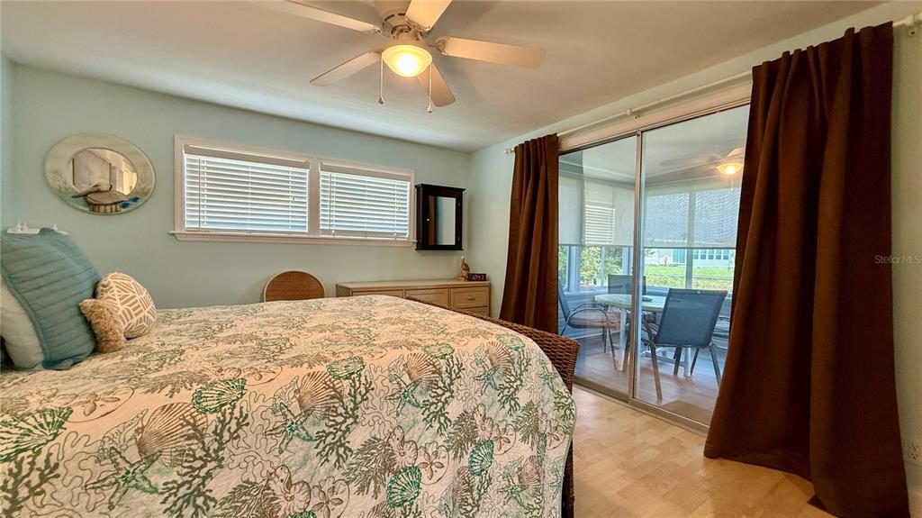 716 Blackburn Boulevard North Port, FL 34287 - Photo 32 of 48 a bedroom with a bed and a window