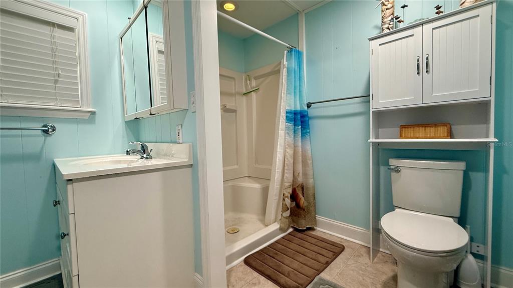 716 Blackburn Boulevard North Port, FL 34287 - Photo 40 of 48 a bathroom with a sink toilet and shower