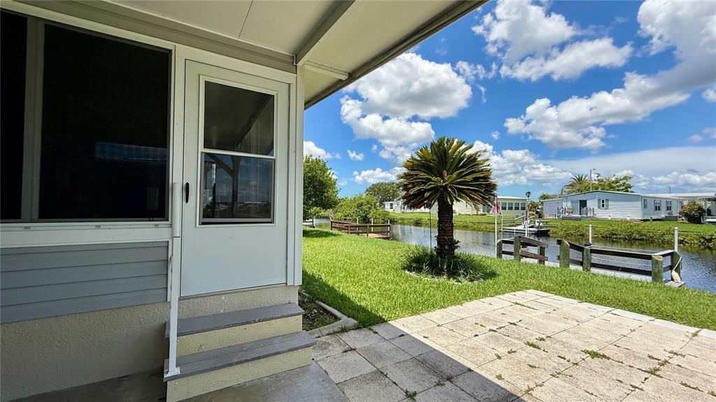 716 Blackburn Boulevard North Port, FL 34287 - Photo 46 of 48 a front view of a house with garden