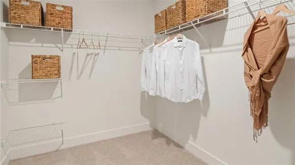 a en suite bathroom with a shower and a sink