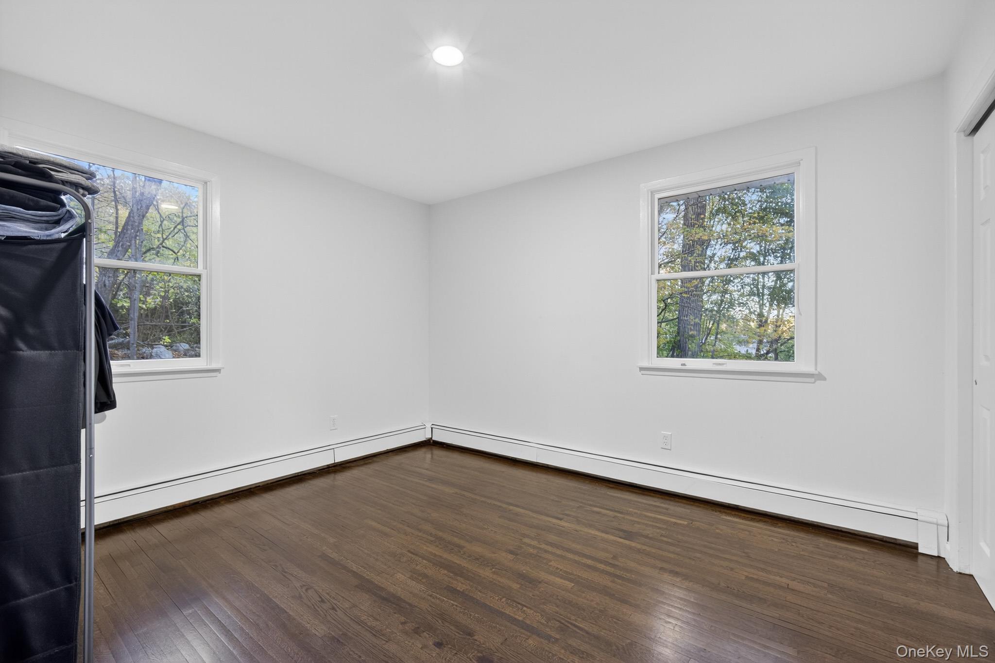 51 Sterling Road Carmel, NY 10512 - Photo 13 of 38 a view of a big room with wooden floor and windows in a room