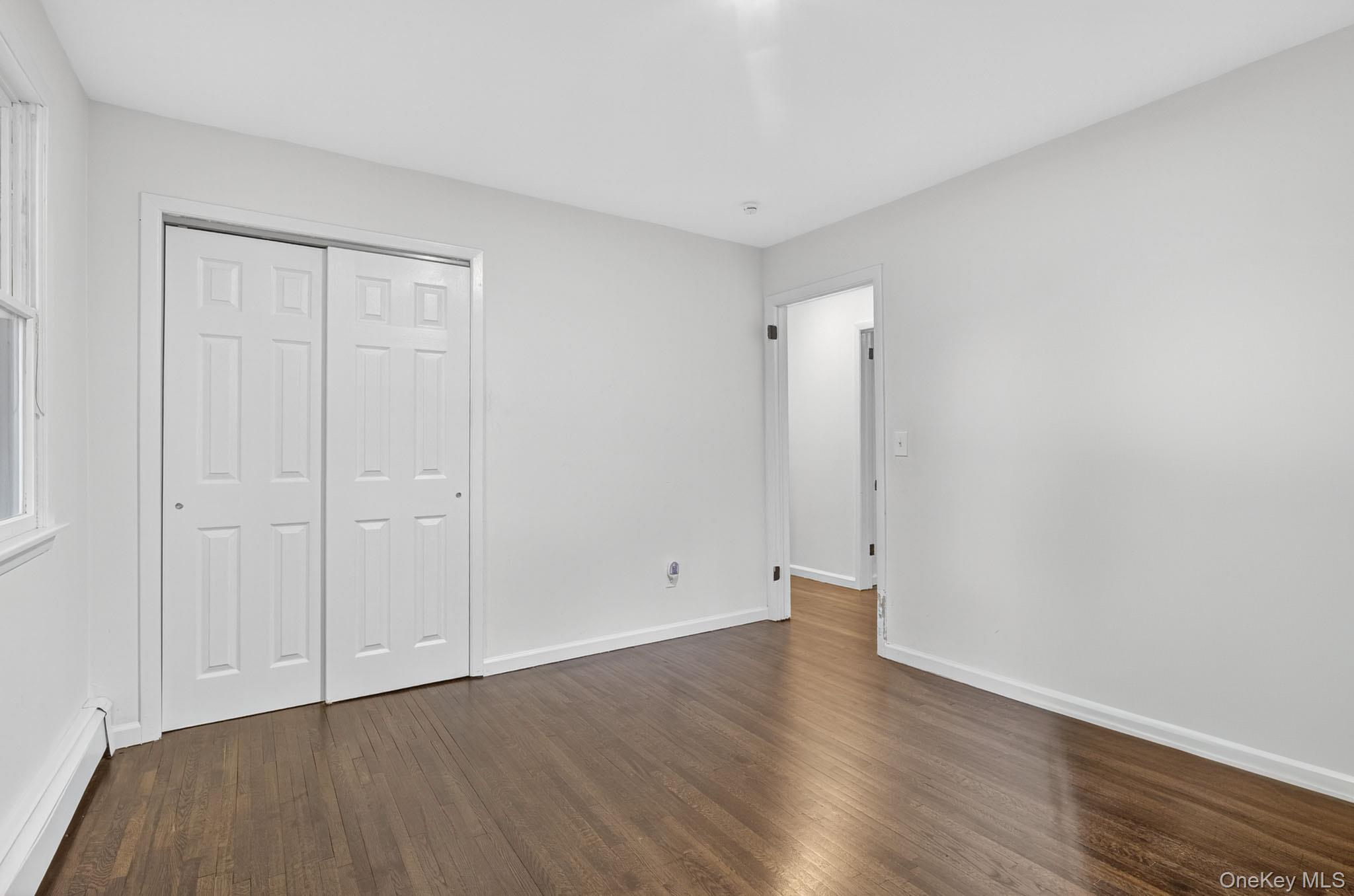 51 Sterling Road Carmel, NY 10512 - Photo 14 of 38 a view of an empty room with wooden floor