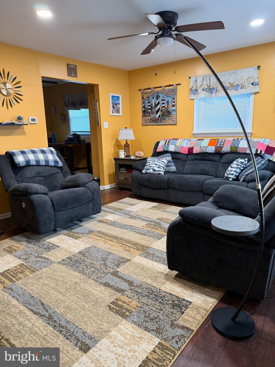 1 Nassau Road Somers Point, NJ 08244 - Photo 5 of 43 a living room with furniture and a flat screen tv