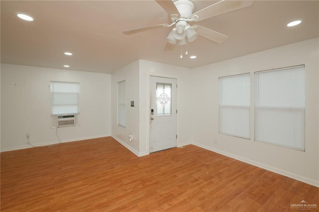 2125 Tucker Road Harlingen, TX 78552 - Photo 2 of 26 a view of an empty room with a window
