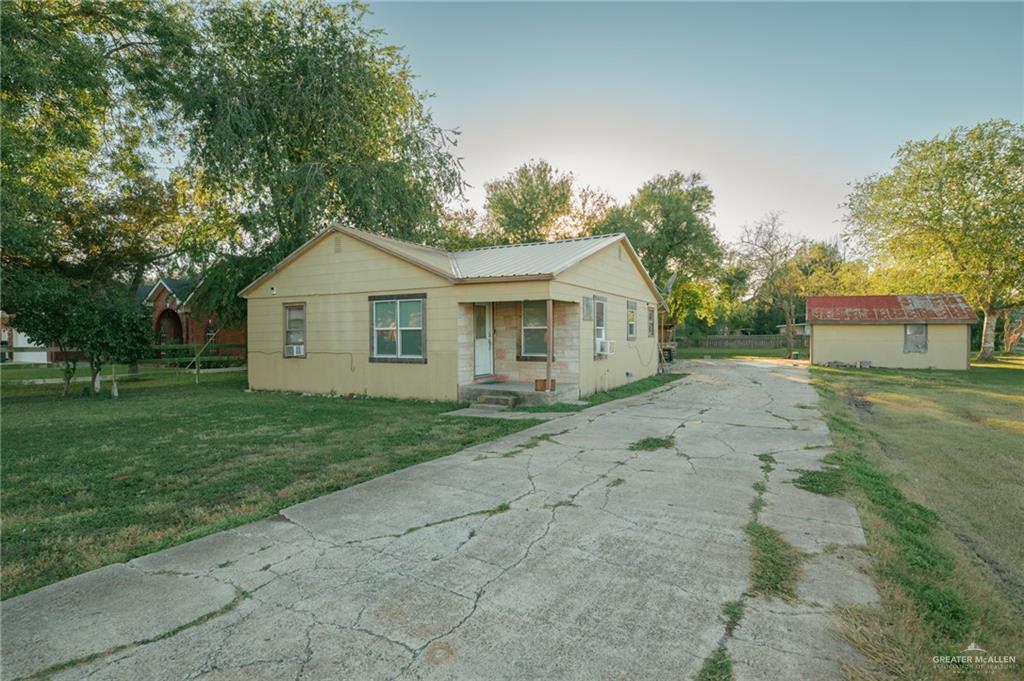 2125 Tucker Road Harlingen, TX 78552 - Photo 22 of 26 a view of a yard with a house and garden