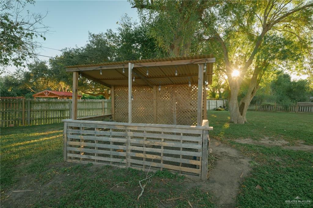 2125 Tucker Road Harlingen, TX 78552 - Photo 26 of 26 a view of a wooden deck with a big yard