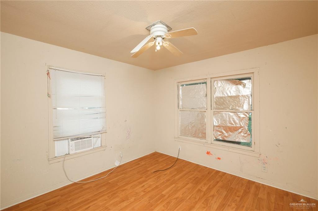 2125 Tucker Road Harlingen, TX 78552 - Photo 8 of 26 a view of an empty room with a window