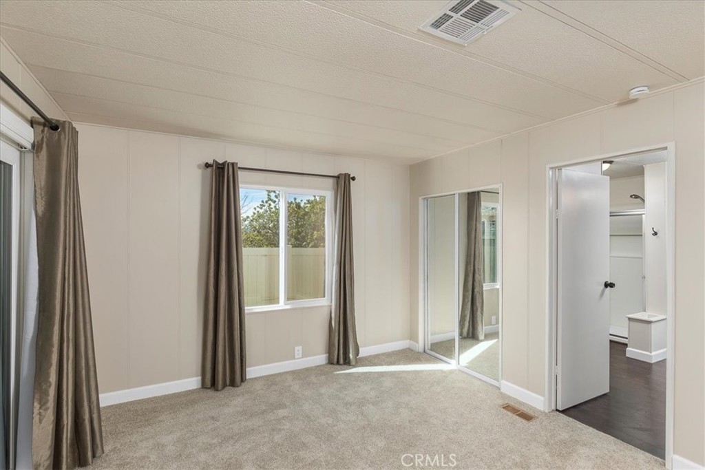 31130 South General Kearny Road, Unit 134 Temecula, CA 92591 - Photo 12 of 54 Primary suite with lots of light. Mirrored closet doors. Entry into adjoining bath.