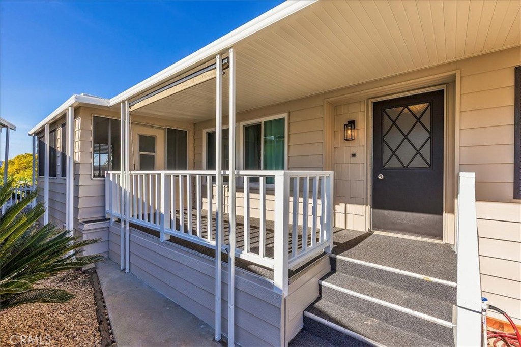 31130 South General Kearny Road, Unit 134 Temecula, CA 92591 - Photo 22 of 54 attractive front porch with additional door into private sunroom.