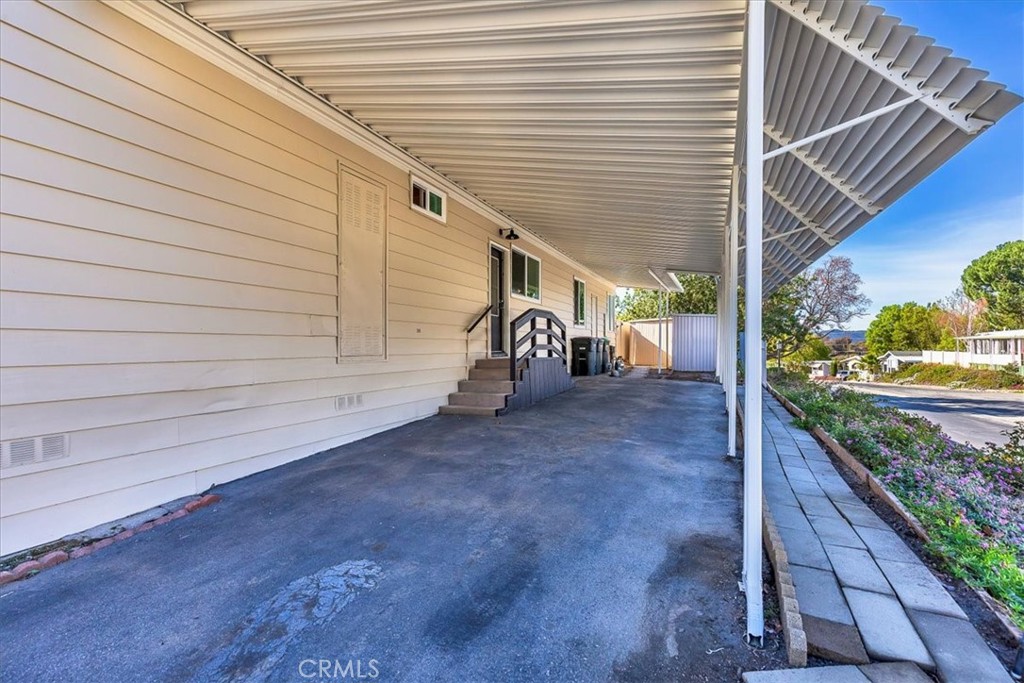 31130 South General Kearny Road, Unit 134 Temecula, CA 92591 - Photo 23 of 54 Car port with 2 outdoor sheds.