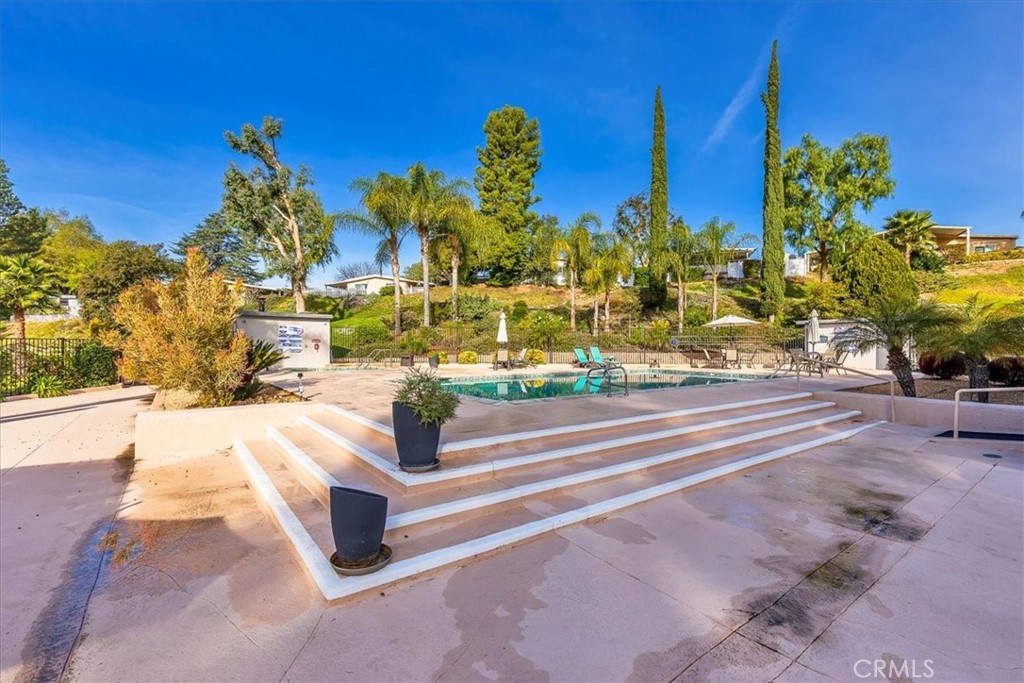 31130 South General Kearny Road, Unit 134 Temecula, CA 92591 - Photo 35 of 54 Community pool and patio area.