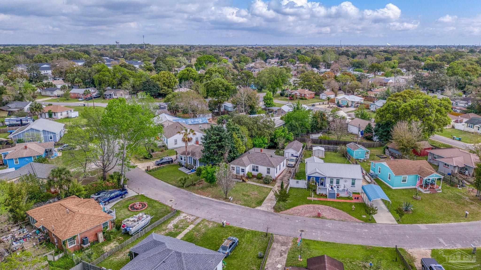 208 Berry Road Pensacola, FL 32507 - Photo 39 of 41 an aerial view of residential houses with outdoor space and street view