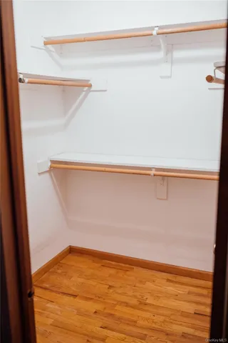 a view of small space with racks on the wall