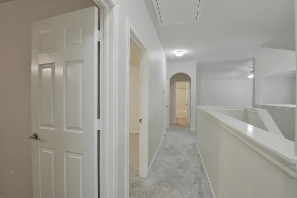 a view of hallway with shower