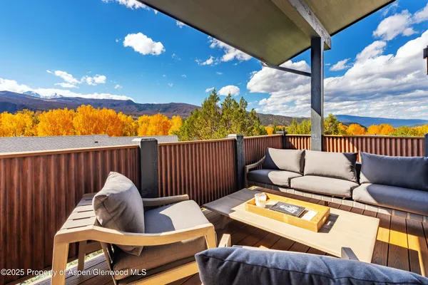 a outdoor living space with furniture
