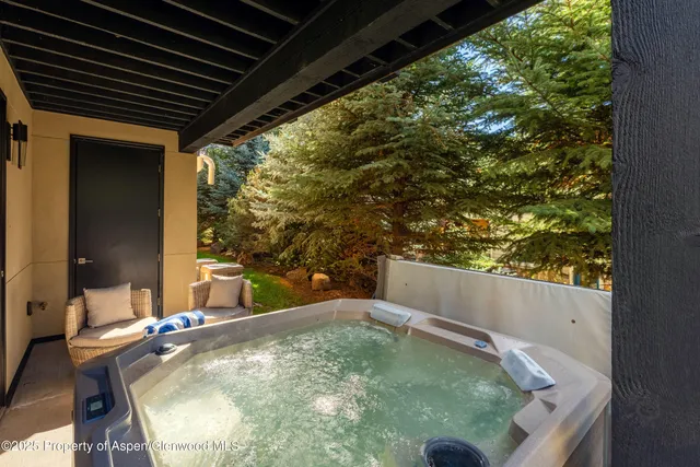 a view of swimming pool from a balcony