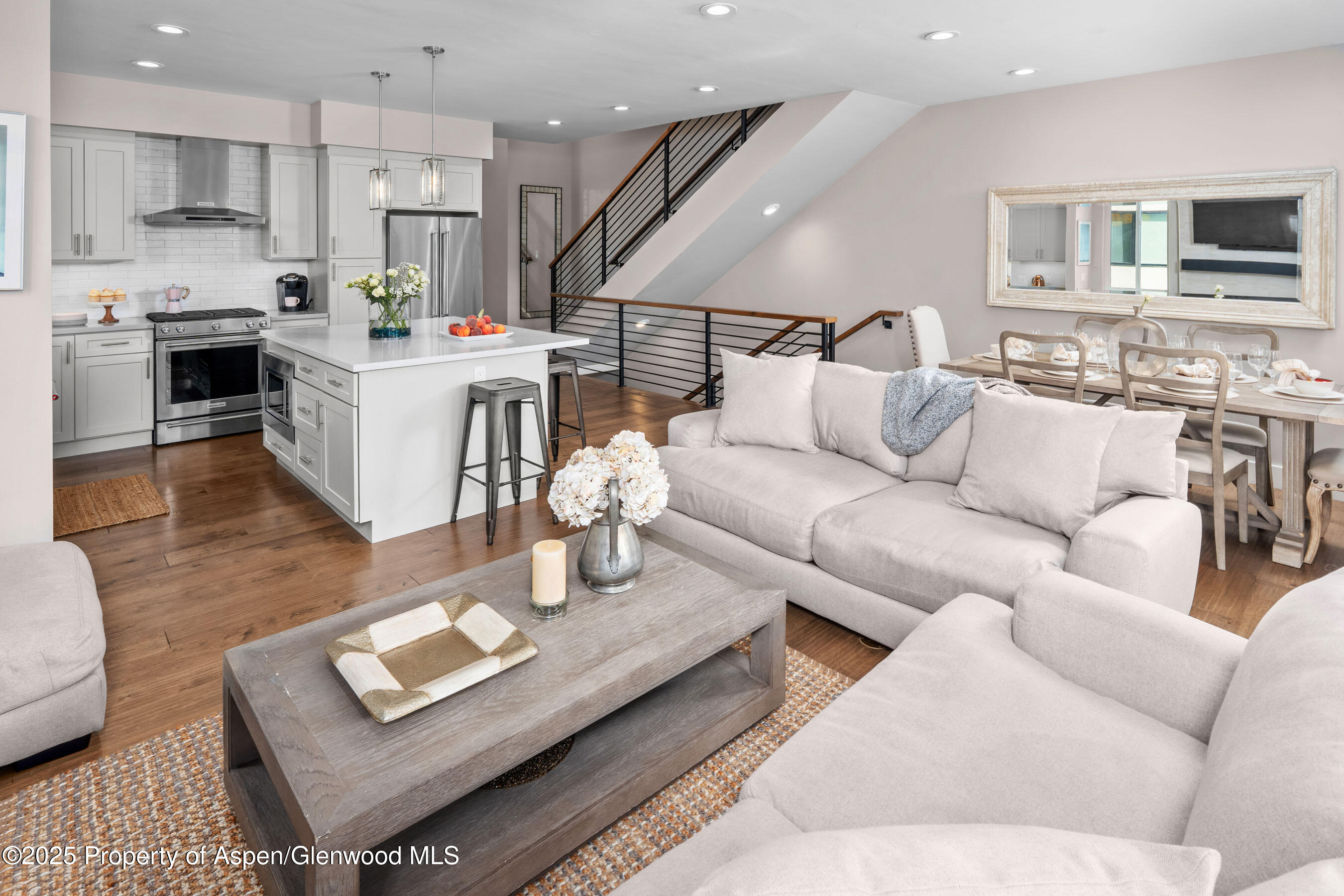 250 Overlook Ridge, Unit 250 Carbondale, CO 81623 - Photo 5 of 41 a living room with furniture kitchen and a table
