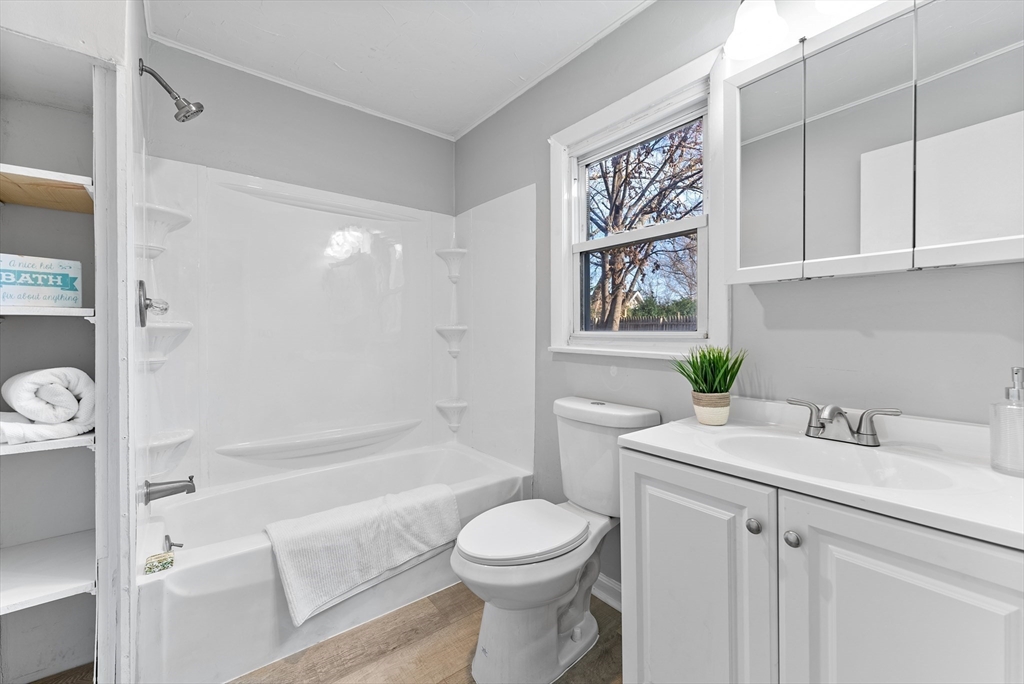 195 Almira Road Springfield, MA 01119 - Photo 15 of 41 a bathroom with a sink a toilet and shower