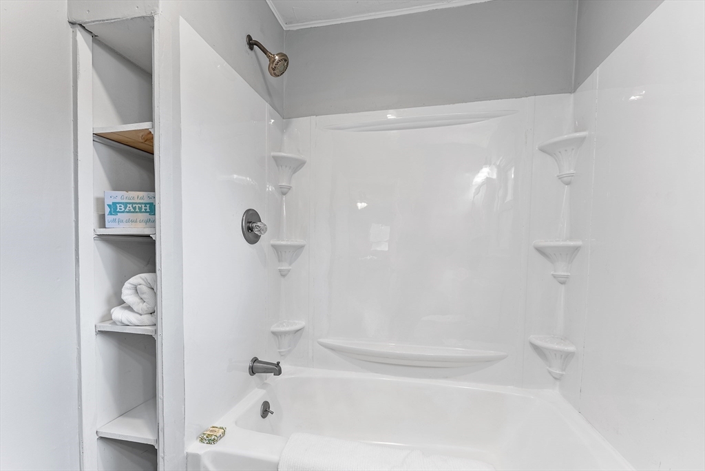195 Almira Road Springfield, MA 01119 - Photo 16 of 41 a bathroom with a bathtub and shower