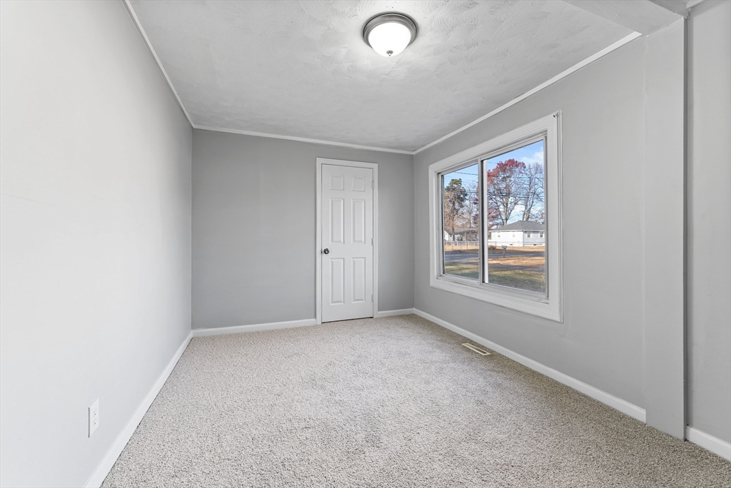 195 Almira Road Springfield, MA 01119 - Photo 19 of 41 an empty room with windows
