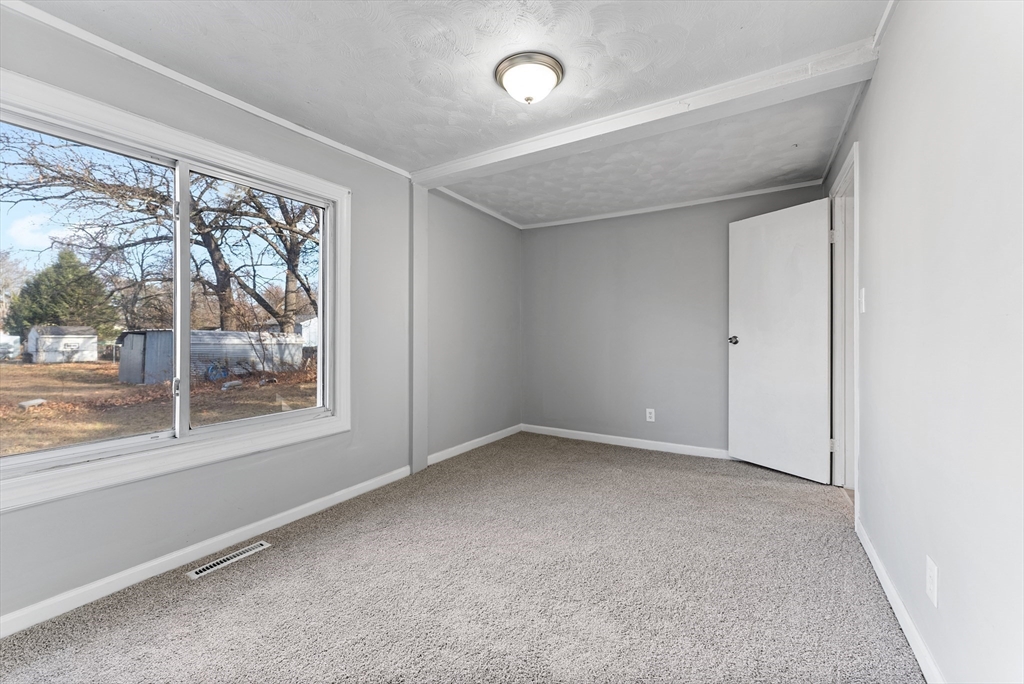 195 Almira Road Springfield, MA 01119 - Photo 20 of 41 an empty room with a window