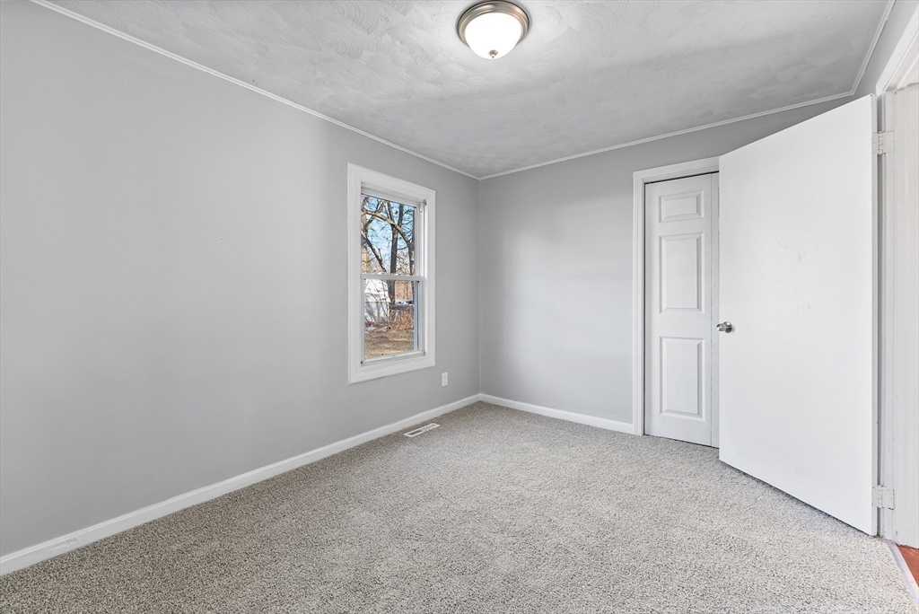 195 Almira Road Springfield, MA 01119 - Photo 22 of 41 an empty room with windows