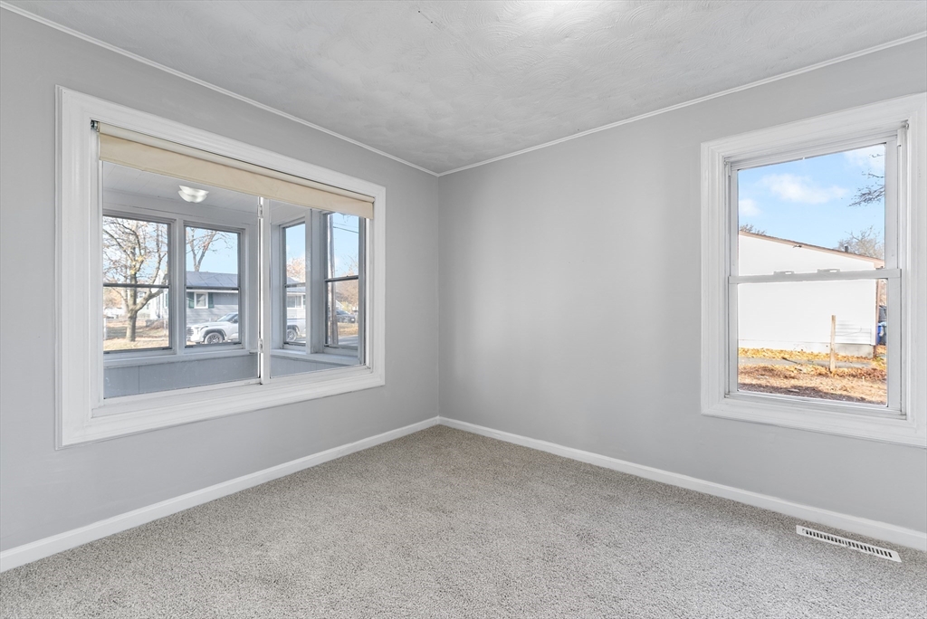 195 Almira Road Springfield, MA 01119 - Photo 25 of 41 an empty room with a window