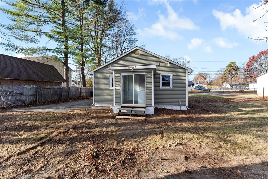 195 Almira Road Springfield, MA 01119 - Photo 31 of 41 a front view of a house with a yard