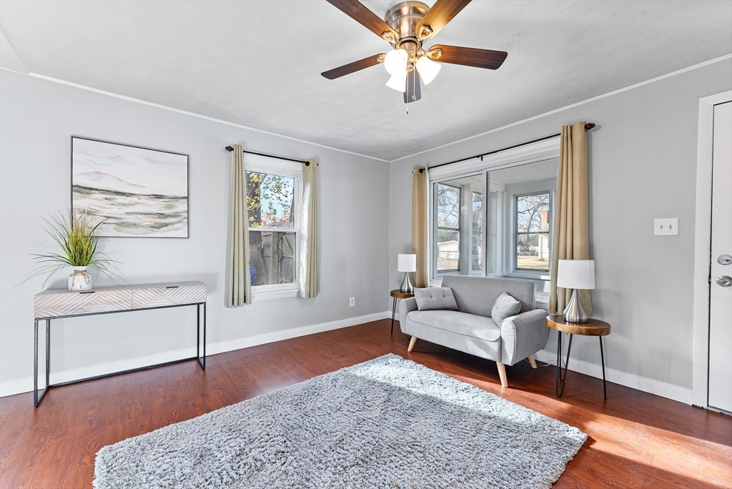 195 Almira Road Springfield, MA 01119 - Photo 7 of 41 a living room with furniture and a wooden floor