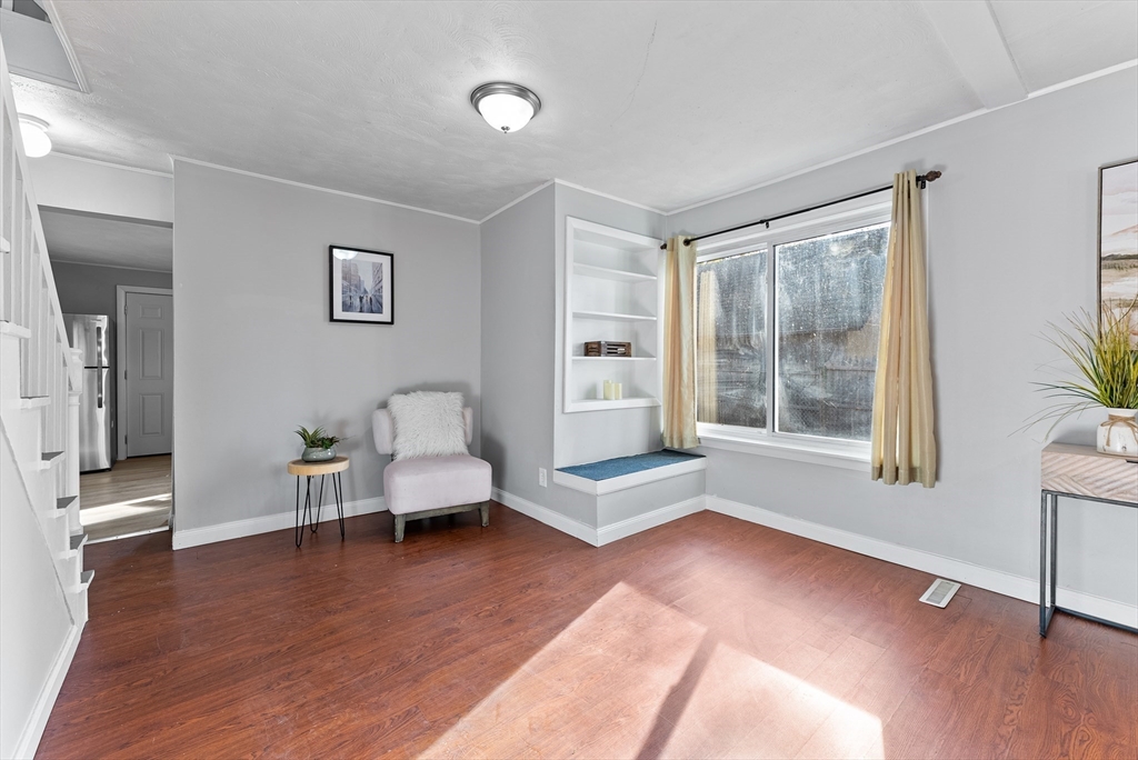 195 Almira Road Springfield, MA 01119 - Photo 8 of 41 a living room with furniture and a wooden floor