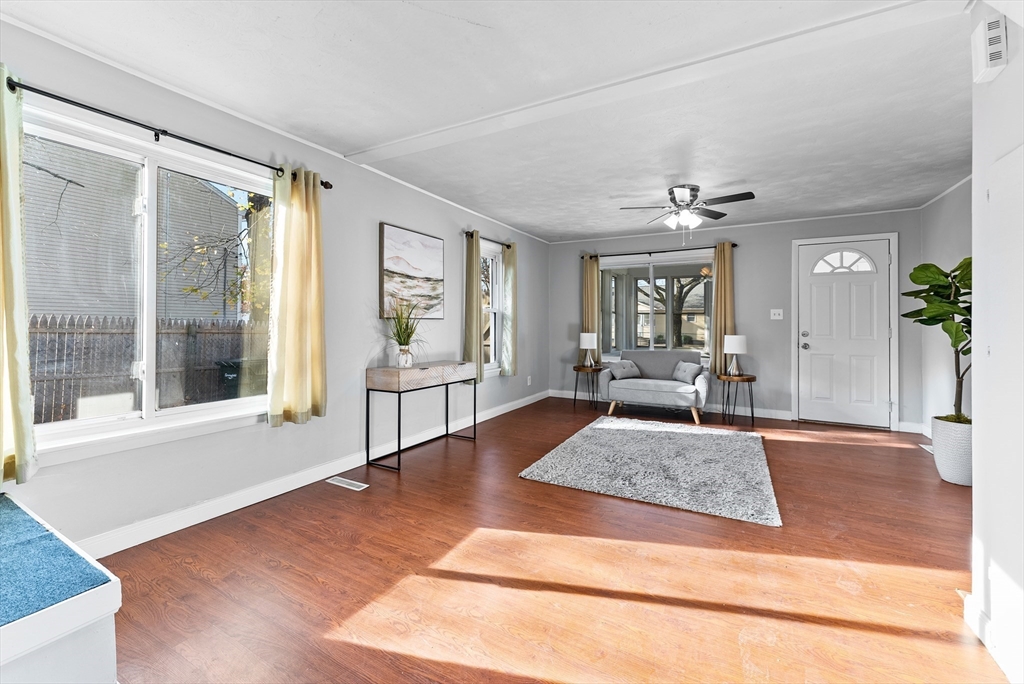 195 Almira Road Springfield, MA 01119 - Photo 10 of 41 a living room with hardwood floor and large window