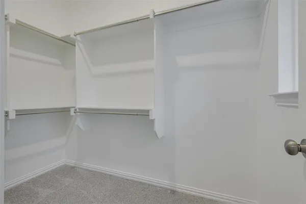 a bathroom with a shower sink double and mirror