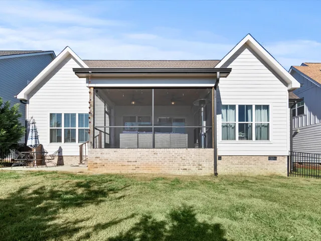 a view of front door and yard
