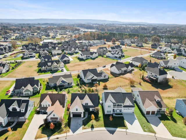 an aerial view of a city with lots of residential buildings