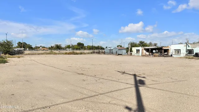 a view of a parking area with a street