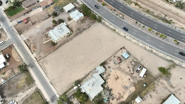 a bathroom with a granite countertop shower and a sink