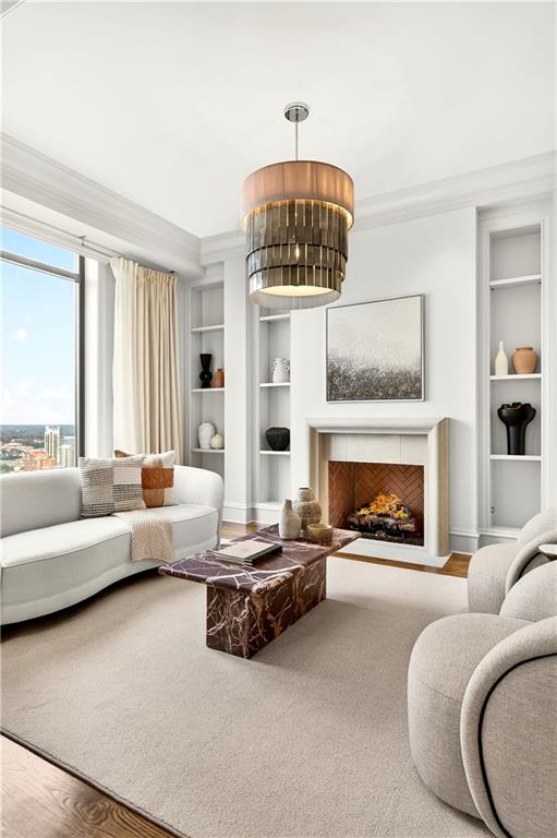 3376 Peachtree Road Northeast, Unit 41A Atlanta, GA 30326 - Photo 14 of 76 a living room with furniture and a fireplace