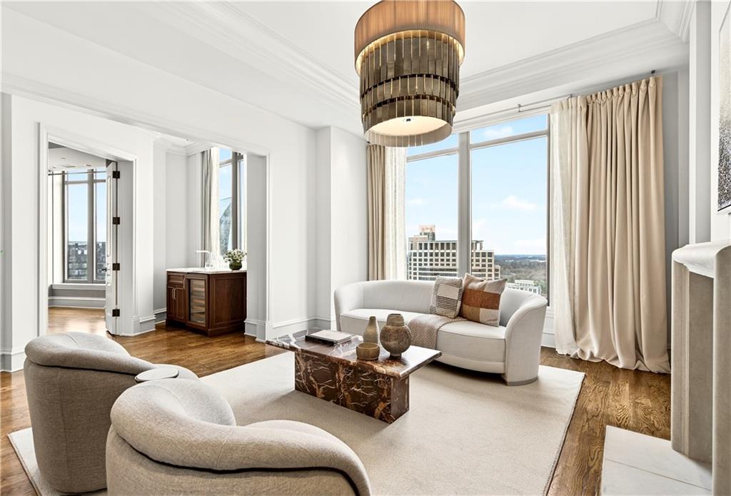 3376 Peachtree Road Northeast, Unit 41A Atlanta, GA 30326 - Photo 19 of 76 a living room with furniture and a large window