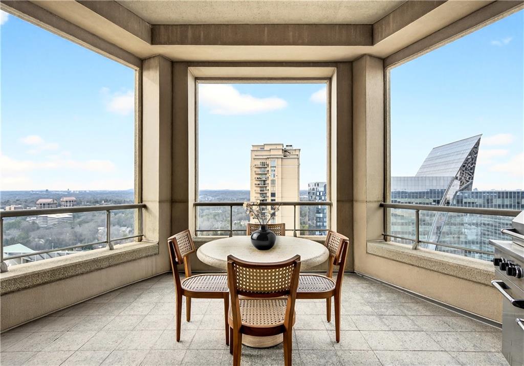 3376 Peachtree Road Northeast, Unit 41A Atlanta, GA 30326 - Photo 29 of 76 a dining room with furniture and window